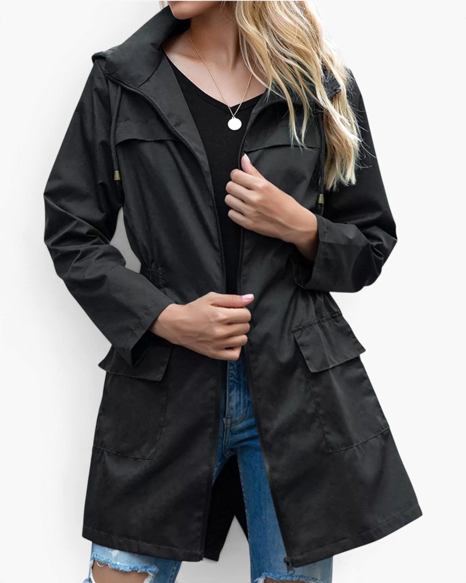 Beach Rose Co. black waterproof hooded rain jacket with zip front, flap pockets, and gathered waist on a model