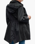 Beach Rose Co. black waterproof hooded rain jacket with a gathered waist, zip front, and flap pockets, back view.