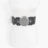Beach Rose Co. black faux leather western belt featuring a large round engraved buckle and multi eyelet detailing.