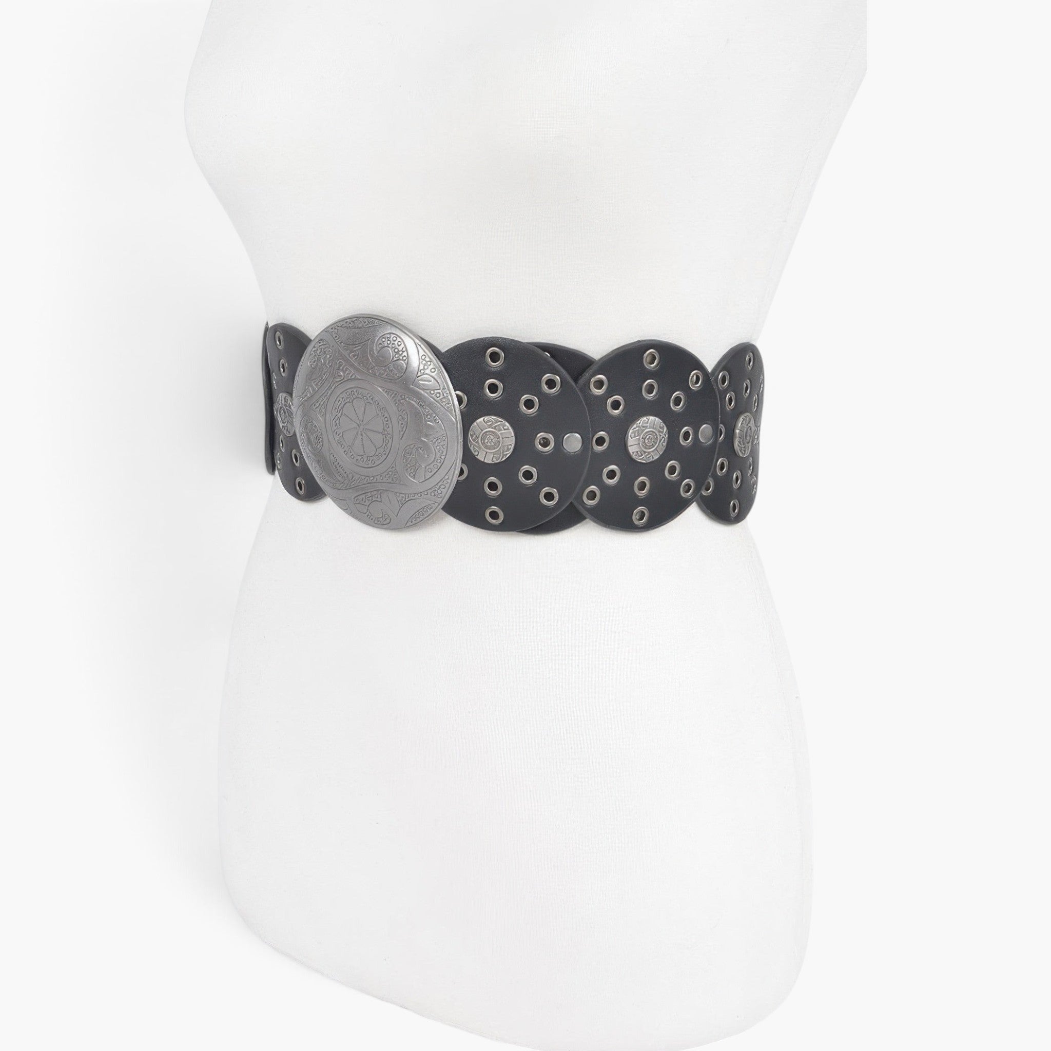 Beach Rose Co. black faux leather western belt featuring a large round engraved buckle and multi eyelet detailing.