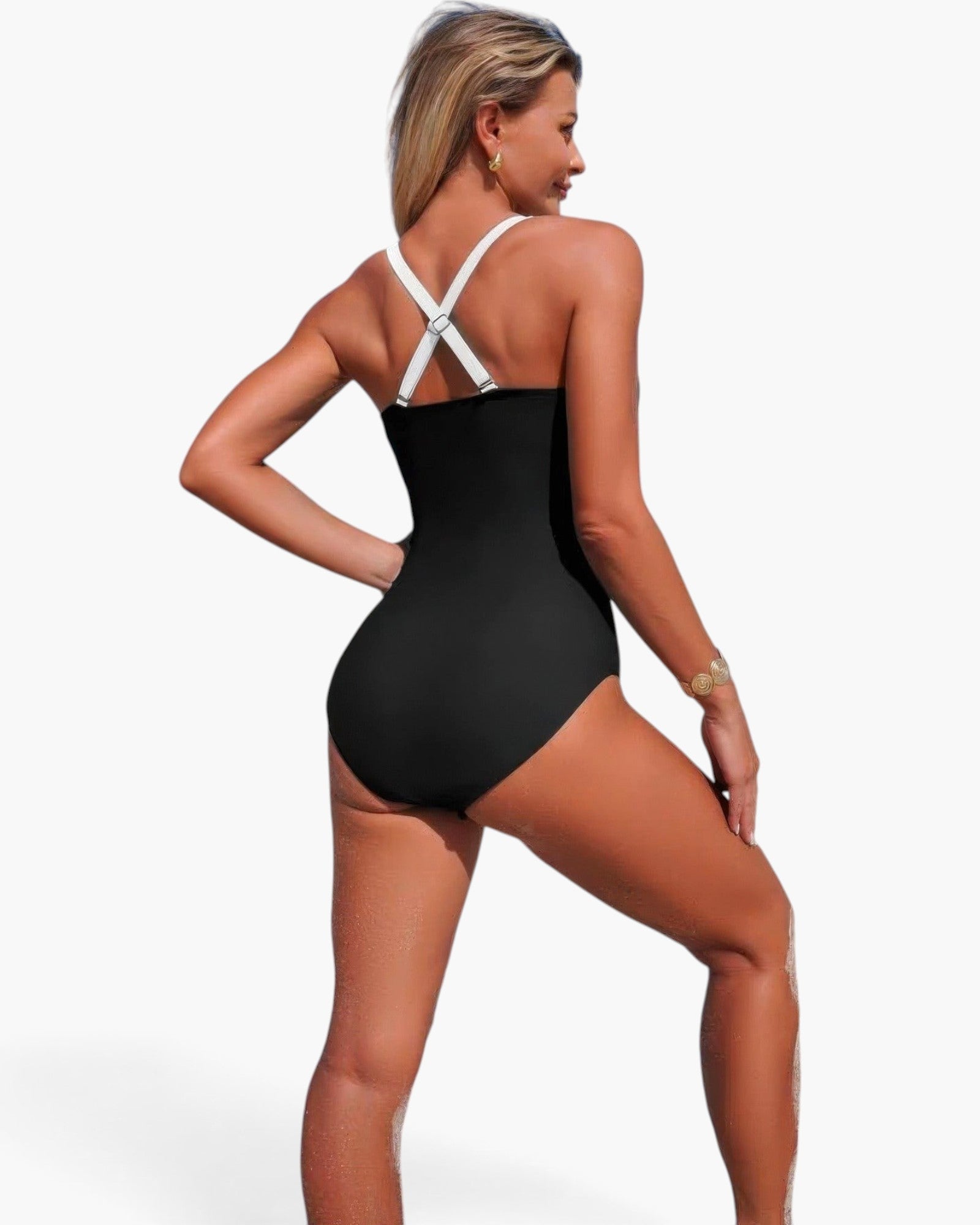 Beach Rose Co. one-piece swimsuit with black body and white crisscross straps viewed from the back