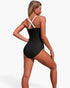 Beach Rose Co. one-piece swimsuit with black body and white crisscross straps viewed from the back
