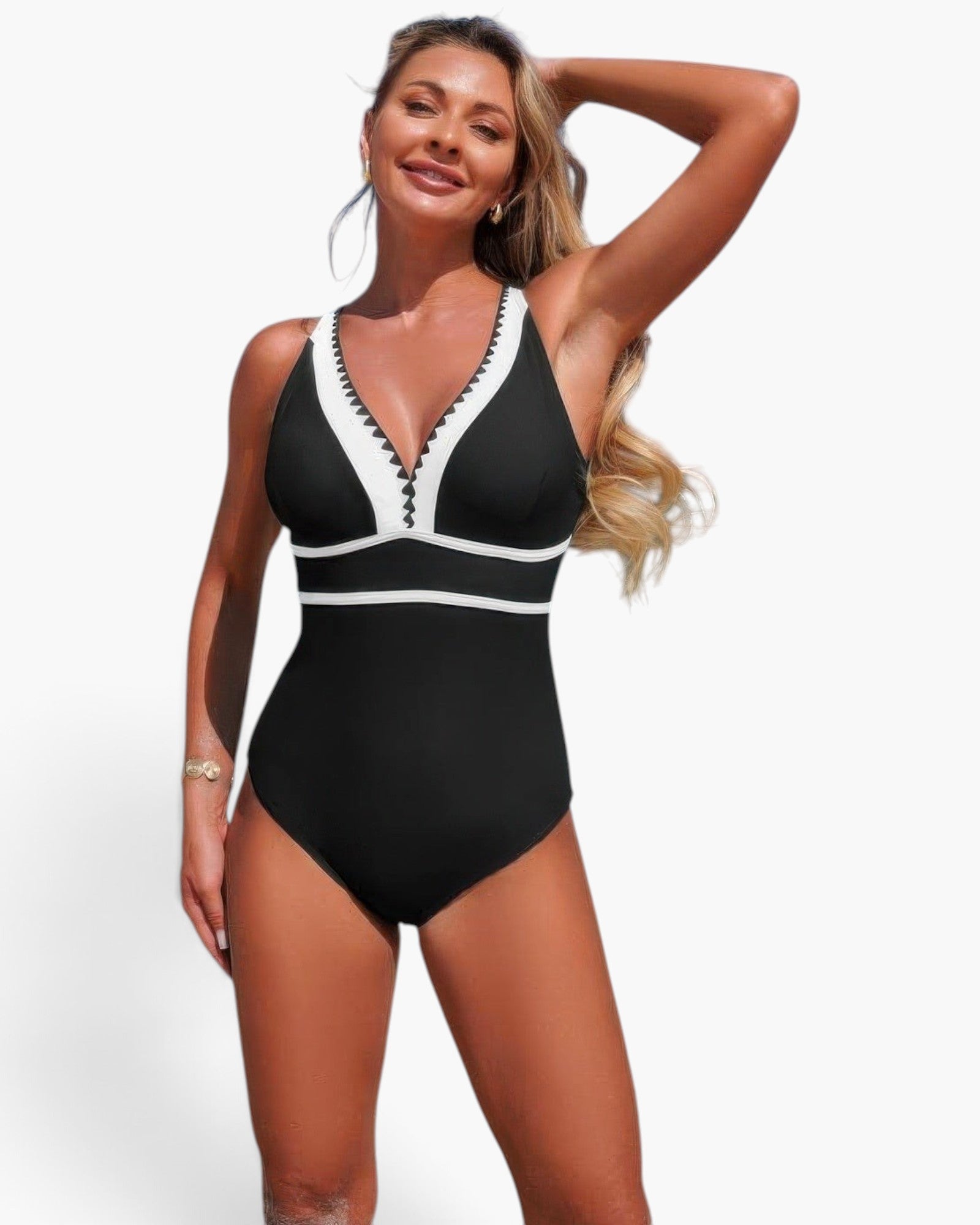 Beach Rose Co. black and white color block one-piece swimsuit with a V-neckline and stretch fabric on a model
