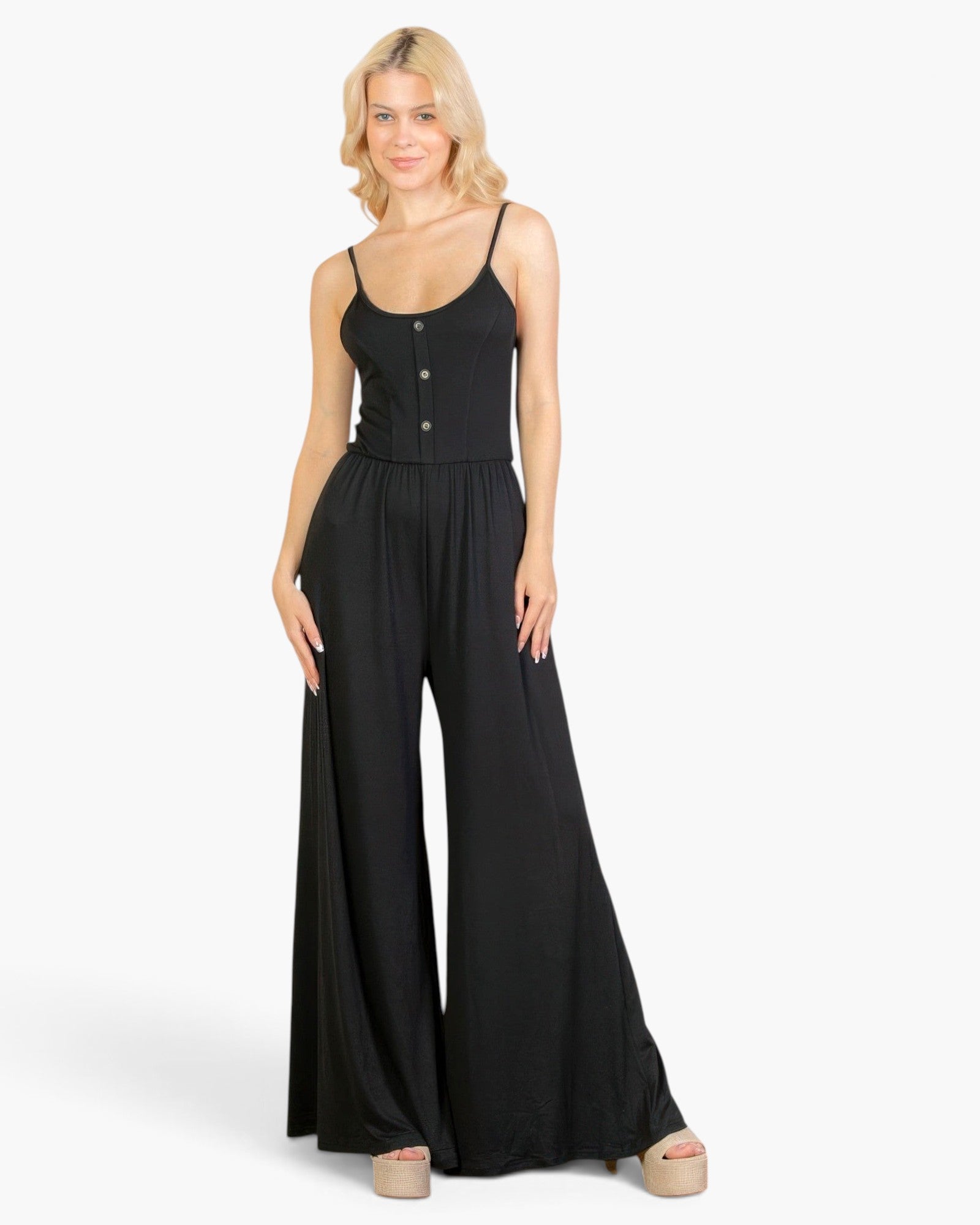 Beach Rose Co. black button-front wide-leg jumpsuit in soft stretch jersey fabric worn by a blonde model