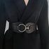 Beach Rose Co. wide black waist belt with a silver-tone ring buckle and lobster clasp worn over a black blazer.