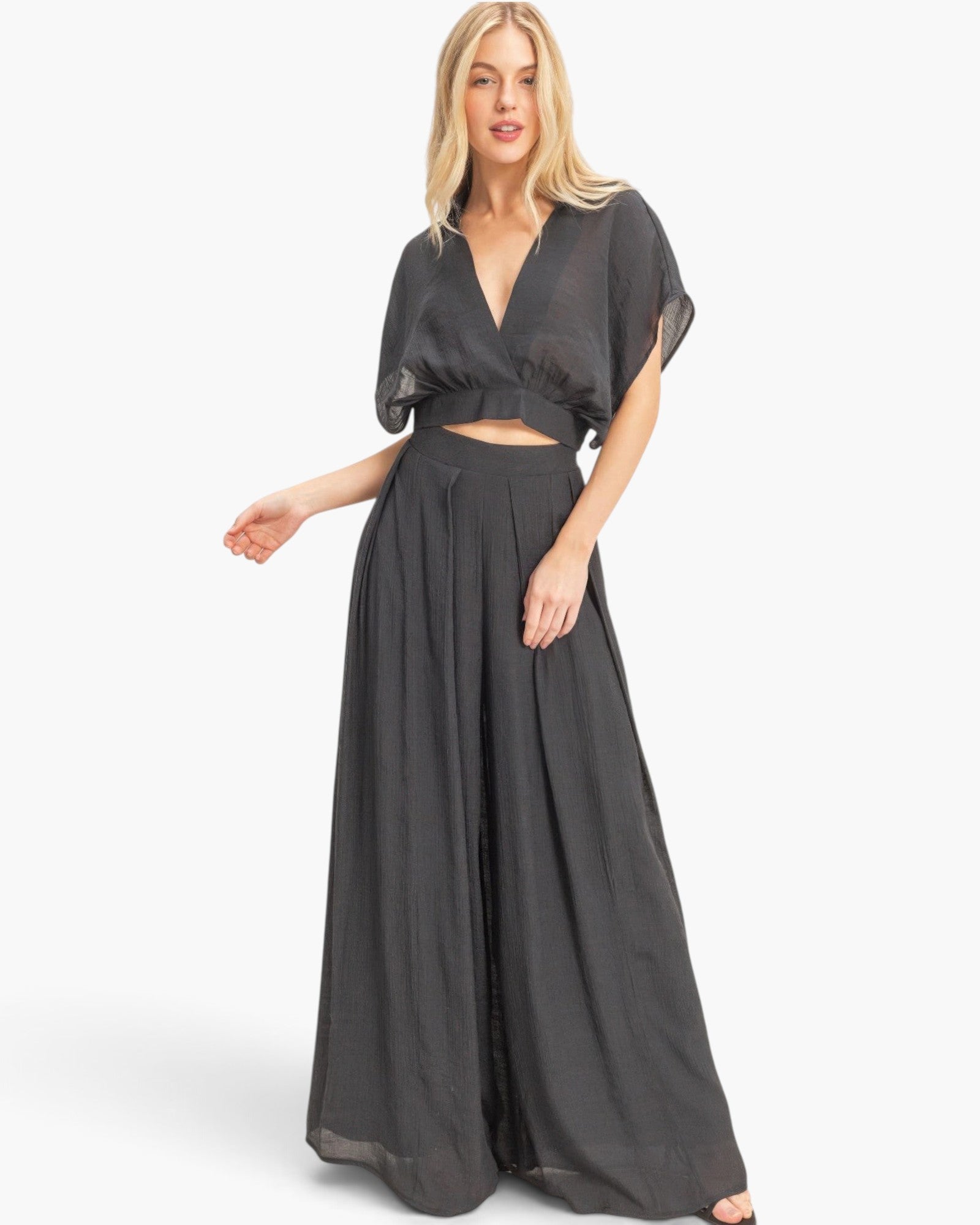 Beach Rose Co. black two-piece set with a cropped collared wrap top and flowing wide-leg pants on a blonde model