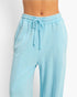 Beach Rose Co. light blue acid wash French terry wide-leg pants with a high-rise elastic drawstring waistband.