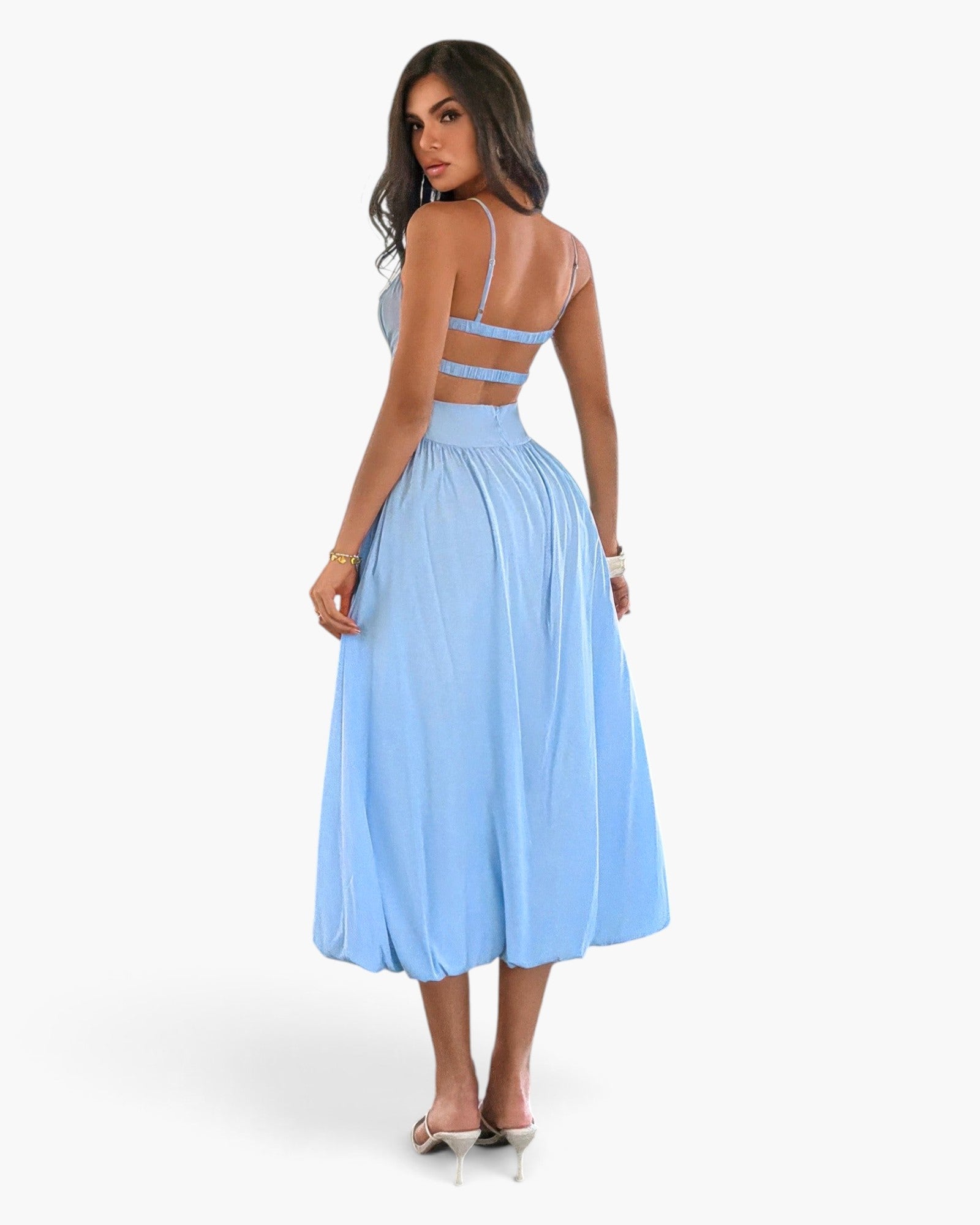 Beach Rose Co. light blue sleeveless A-line dress with a ruched bust and open back worn by a model