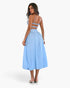 Beach Rose Co. light blue sleeveless A-line dress with a ruched bust and open back worn by a model