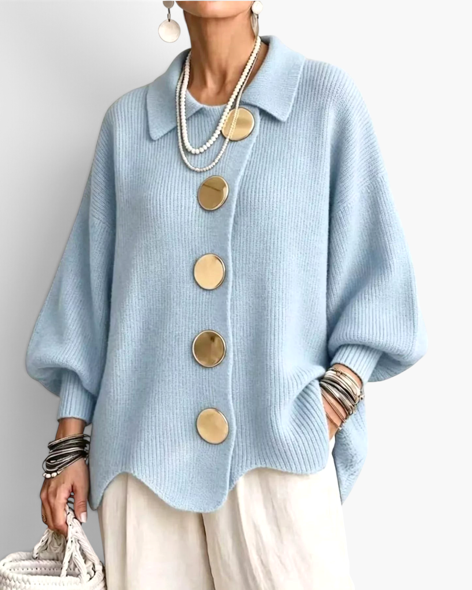 Beach Rose Co. light blue ribbed knit cardigan with oversized gold buttons, balloon sleeves, and a scalloped hem.