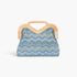 Beach Rose Co. faux straw clutch with a blue chevron pattern and a natural wooden frame for a chic, modern look.