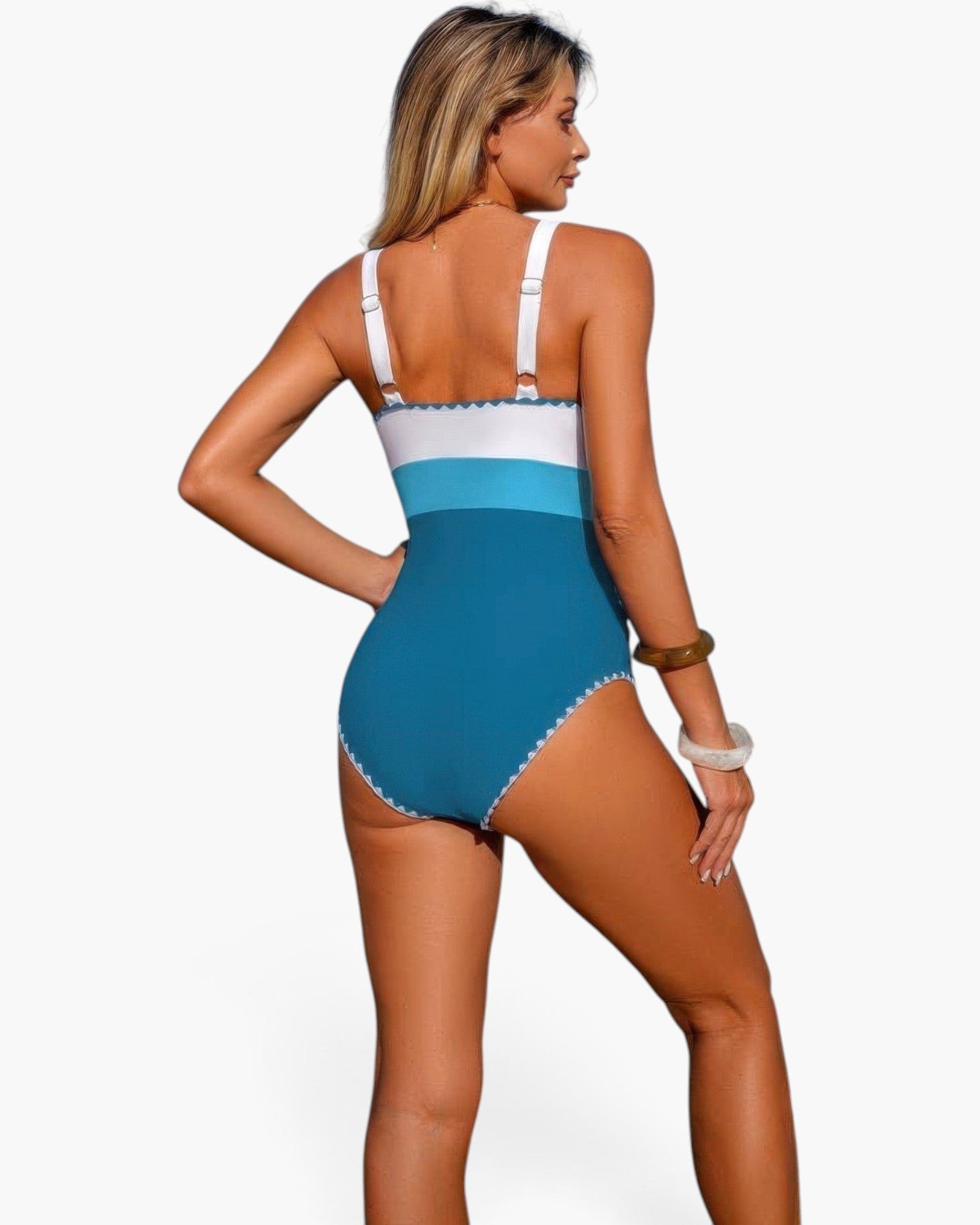 Beach Rose Co. one-piece swimsuit with a blue color block design, U-neckline, and white straps on a blonde model.