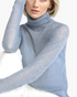 Beach Rose Co. light blue fine knit long sleeve turtleneck sweater with a soft, sheer texture worn by a blonde model.