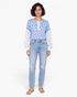 Beach Rose Co. blue floral print long sleeve top with buttoned placket and contrast patterned sleeves.