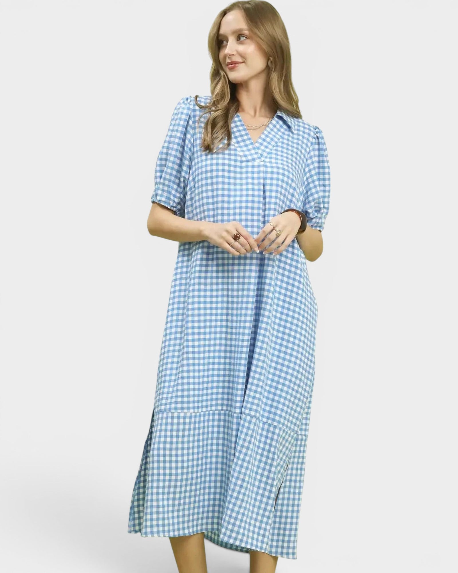 Beach Rose Co. blue and white gingham midi dress with collared split neckline, short puff sleeves, and ruffle hem.