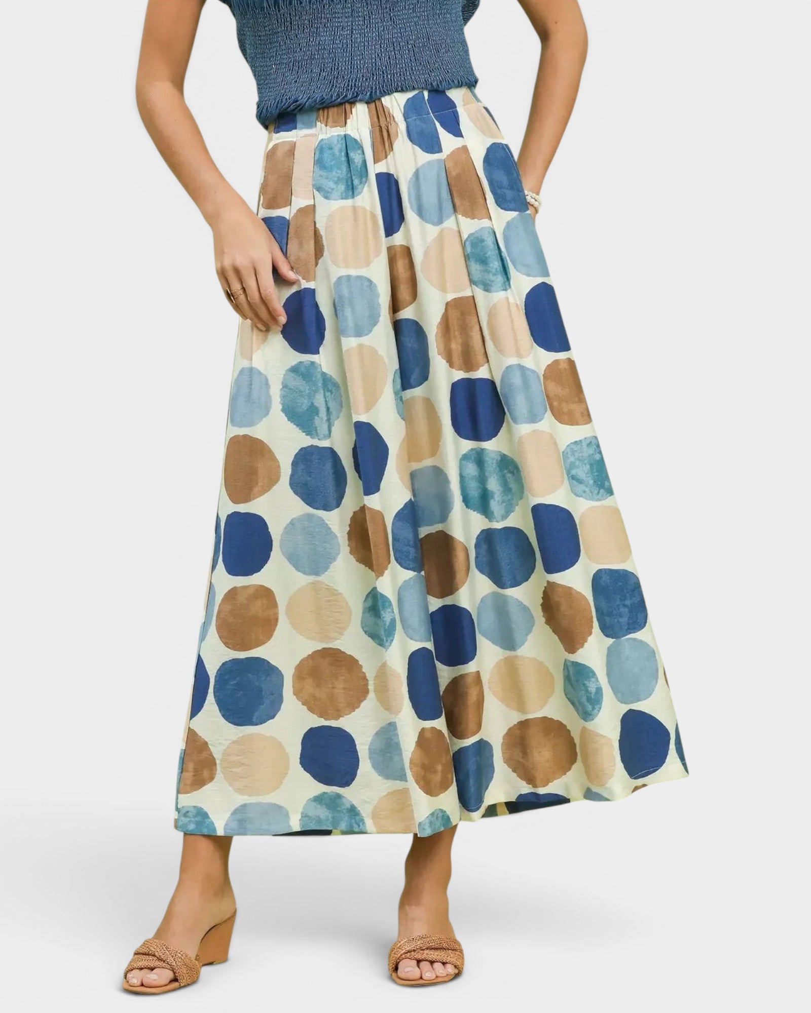 Beach Rose Co. wide leg pants with blue, brown, and tan multi-dot print. Made of rayon and nylon.