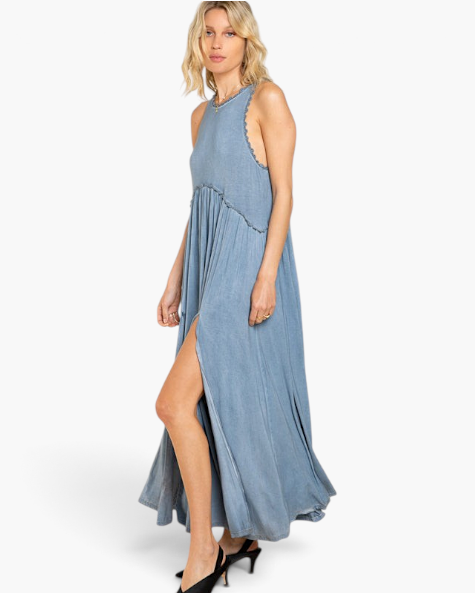 Beach Rose Co. blue maxi dress with racerback, pleated skirt, and side slit worn by a blonde model