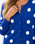 Beach Rose Co. royal blue knit cardigan with oversized white polka dots, button-front closure, and ribbed trim.