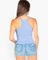 Beach Rose Co. light blue ribbed knit racerback cami top worn by a woman with long hair, back view