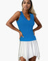 Beach Rose Co. blue ribbed V-neck sleeveless top worn by a model with a white skirt against a plain background