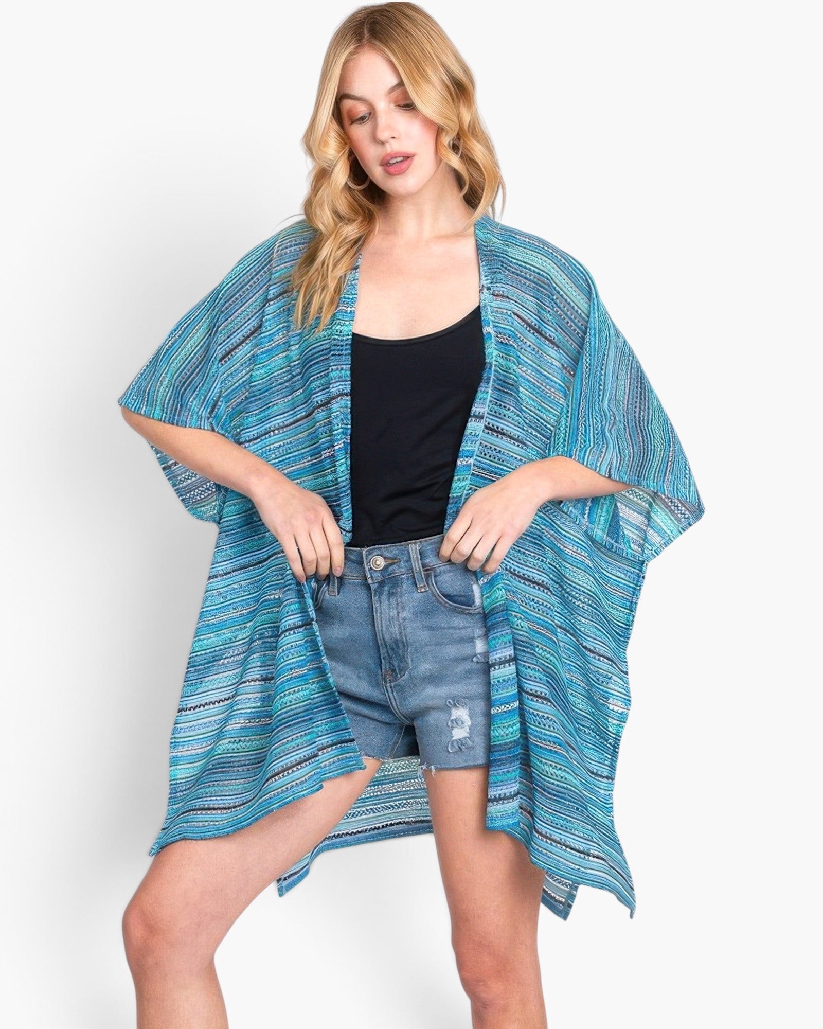 Beach Rose Co. blue multi-color stripe crochet open front cover-up worn by a blonde model over a black tank and shorts