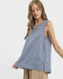 Beach Rose Co. blue and white striped linen blend sleeveless top with fringe trim and raw hem.