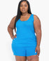 Beach Rose Co. plus size model wearing a bright blue stretchy jersey tank top and matching shorts set