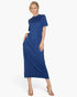 Beach Rose Co. blue jersey tee dress with side pockets worn by a blonde model in clear heels against a white background