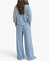 Beach Rose Co. light blue waffle knit two-piece lounge set with long sleeves and wide-leg pants, back view.