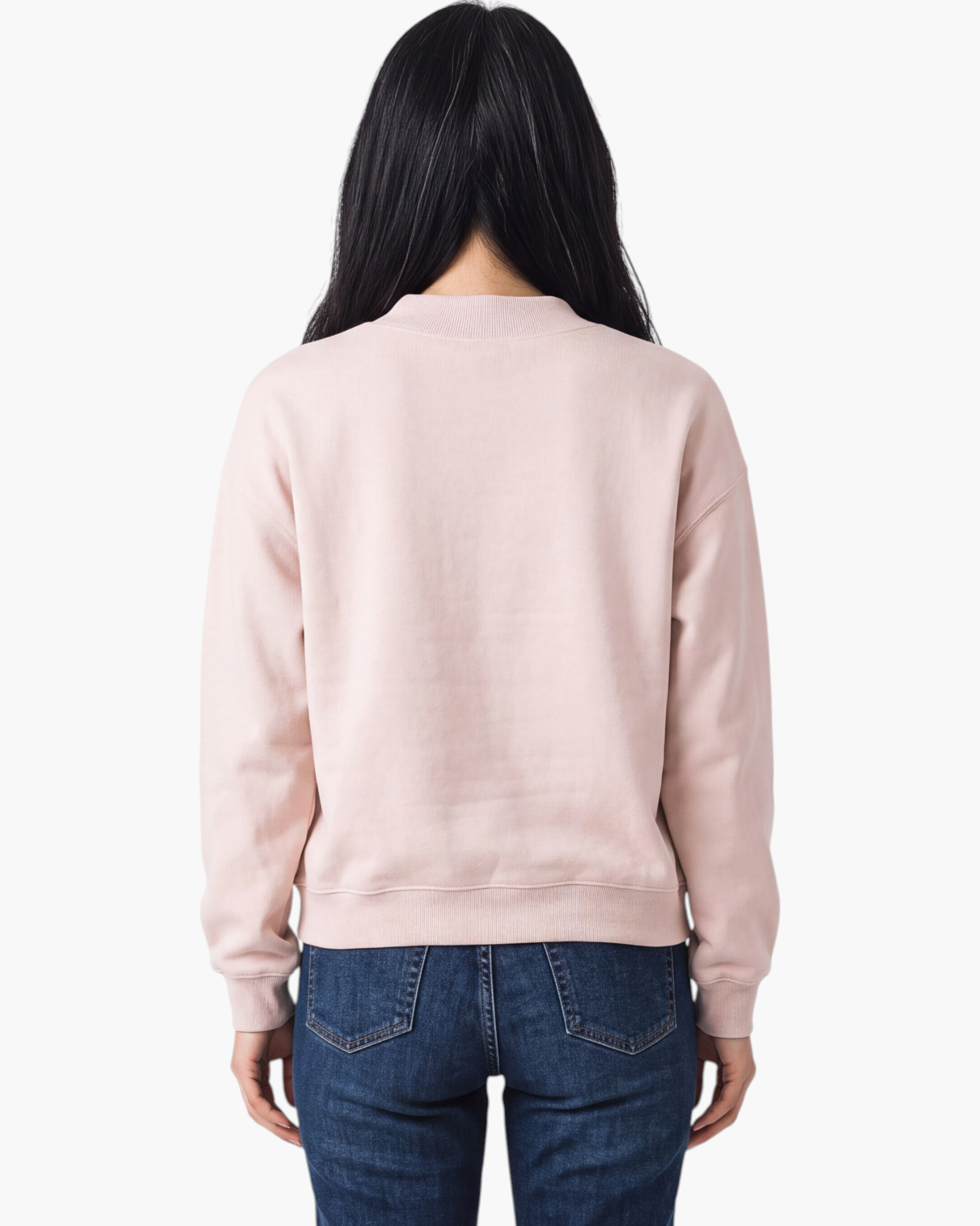 Back view of Beach Rose Co. blush pink mock neck sweatshirt with ribbed hem and cuffs worn by a woman with dark hair.