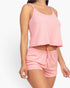 Beach Rose Co. blush pink ribbed strappy tank top and matching drawstring shorts set on a model