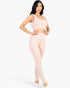 Beach Rose Co. model wearing a blush pink ribbed crop top and high-waisted leggings set for a sleek, active look.