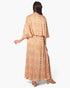 Beach Rose Co. bohemian maxi dress in tan chiffon with metallic lurex threads and a flowing cape overlay, back view.