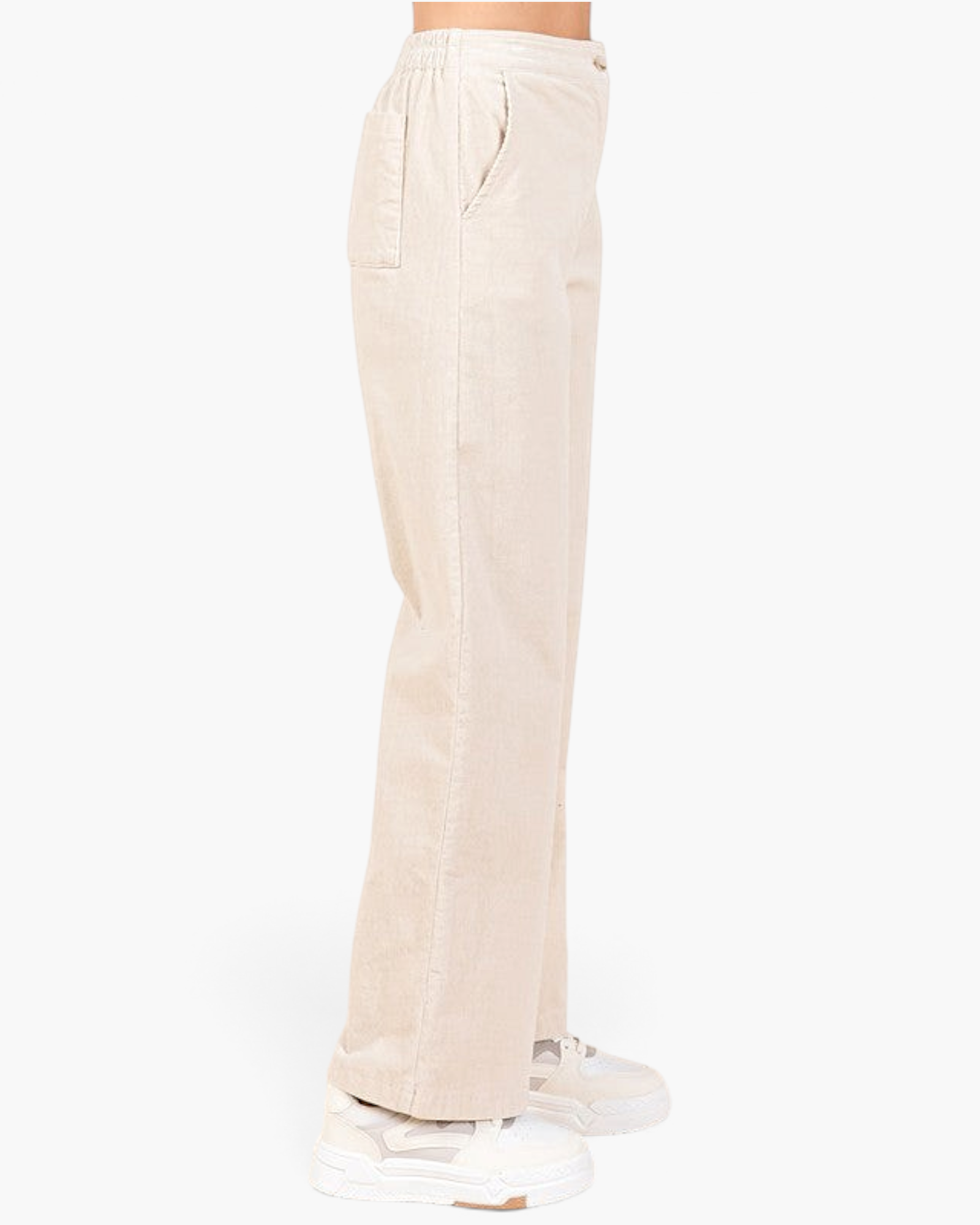 Side view of Beach Rose Co. bone corduroy wide-leg pants with an elasticized back waist and front pockets.