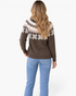 Beach Rose Co. brown knit sweater with ivory Fair Isle pattern and colorful confetti flecks, back view on a model.