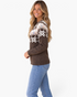 Beach Rose Co. brown knit sweater with ivory Fair Isle pattern and colorful confetti flecks worn by a smiling woman.