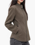 Beach Rose Co. brown faux leather moto jacket with a stand collar, zip front, and curved hem worn by a model.