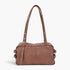 Beach Rose Co. brown faux leather sport bag with dual handles and silver metal hardware details.