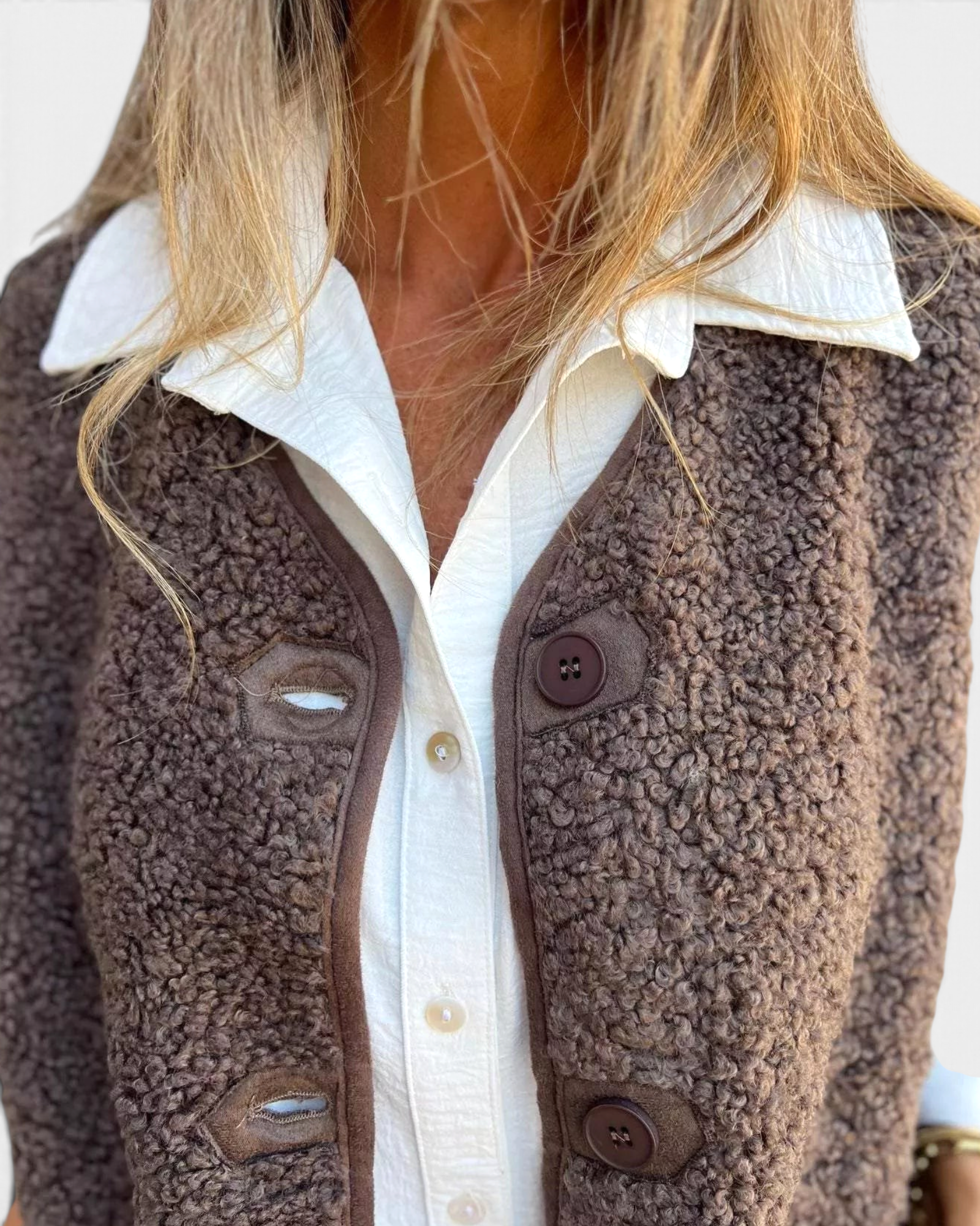 Beach Rose Co. brown textured polar fleece button-front vest layered over a white collared shirt