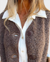 Beach Rose Co. brown textured polar fleece button-front vest layered over a white collared shirt