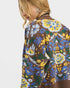 Beach Rose Co. brown knit cardigan with blue, yellow, and green floral pattern. Cropped, V-neck, button front, balloon sleeves.