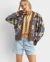 Beach Rose Co. brown knit cardigan with blue, yellow, green floral pattern, V-neck, button front, balloon sleeves, and cropped length.