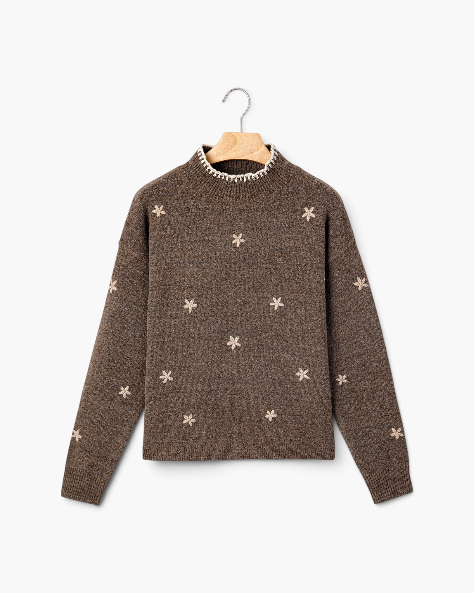 Beach Rose Co. brown knit sweater with cream floral embroidery and contrast stitching on the mock neck.