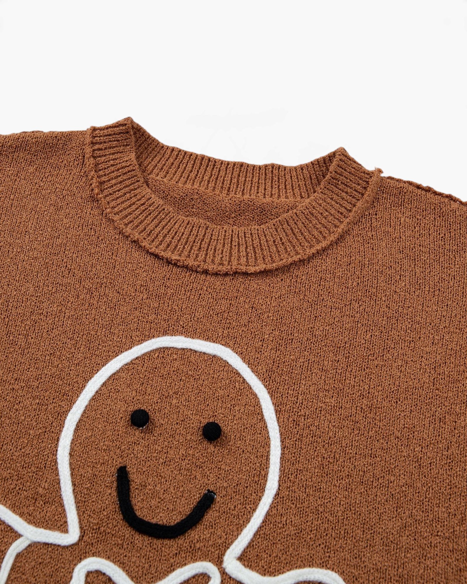 Beach Rose Co. brown crewneck sweater featuring a smiling gingerbread man design with raised white icing details.