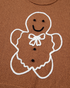 Beach Rose Co. brown crewneck sweater featuring a raised white gingerbread man design with a bow and icing details.