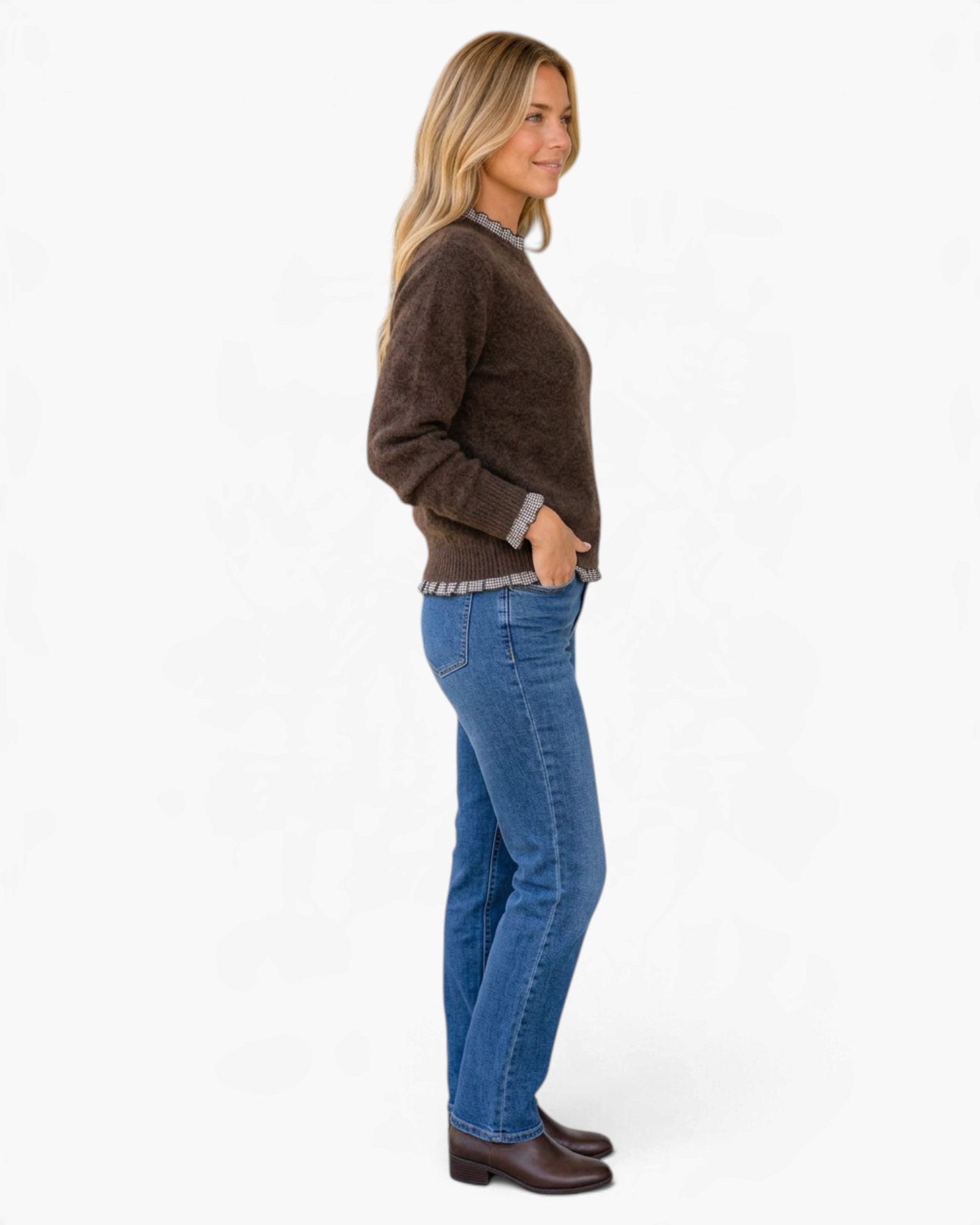 Beach Rose Co. brown textured knit sweater with gingham ruffle trim at the neck, cuffs, and hem worn with blue jeans.