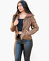 Beach Rose Co. brown faux leather jacket with an attached hood, worn by a model over a black top and leggings.