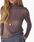 Beach Rose Co. fine knit brown long sleeve turtleneck sweater with ribbed edges worn with a gold pendant necklace