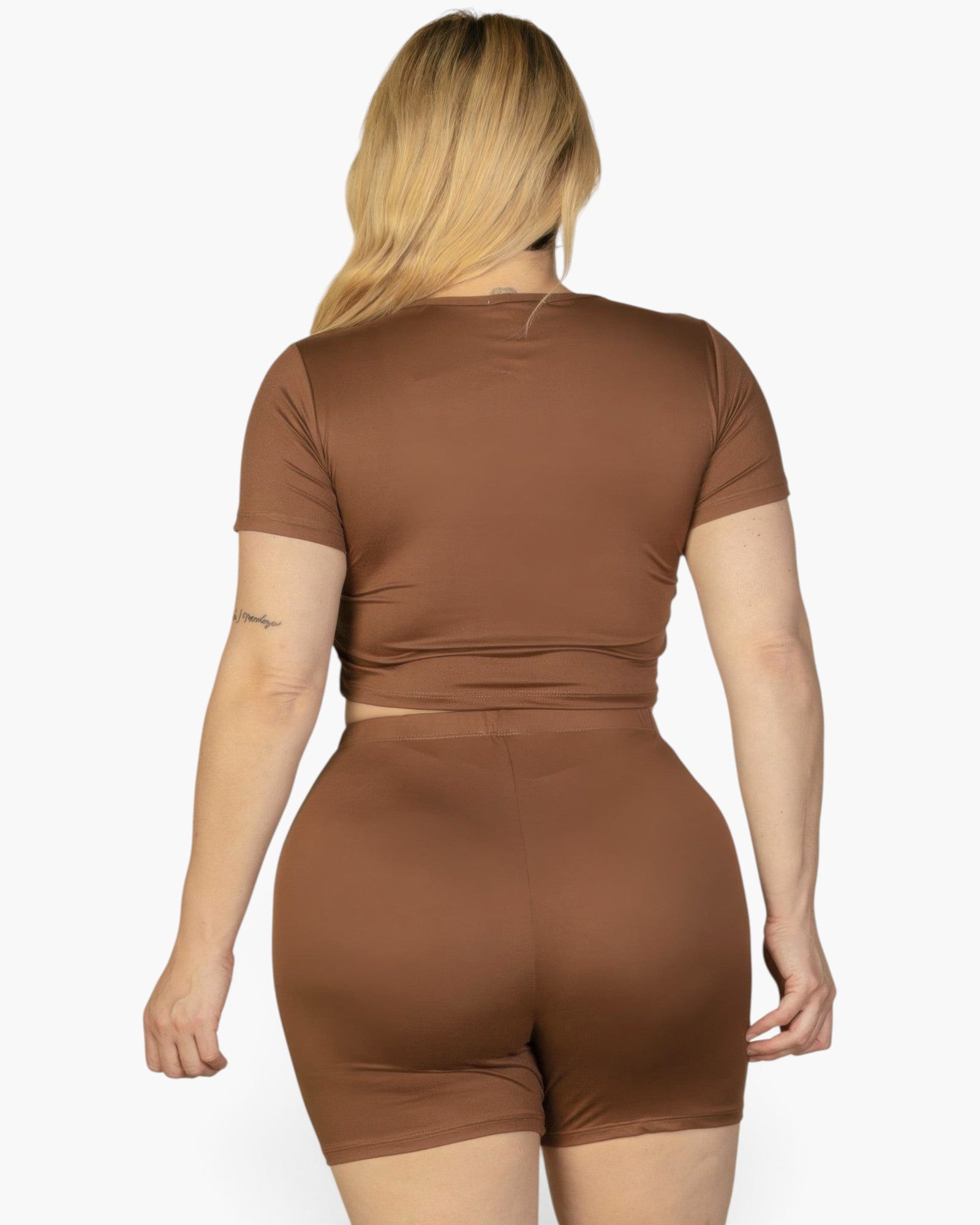 Beach Rose Co. plus size brown short sleeve crop top and shorts set viewed from the back on a blonde model.