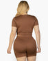 Beach Rose Co. plus size brown short sleeve crop top and shorts set viewed from the back on a blonde model.